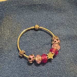 Elegant Pink and Gold Charm Bracelet